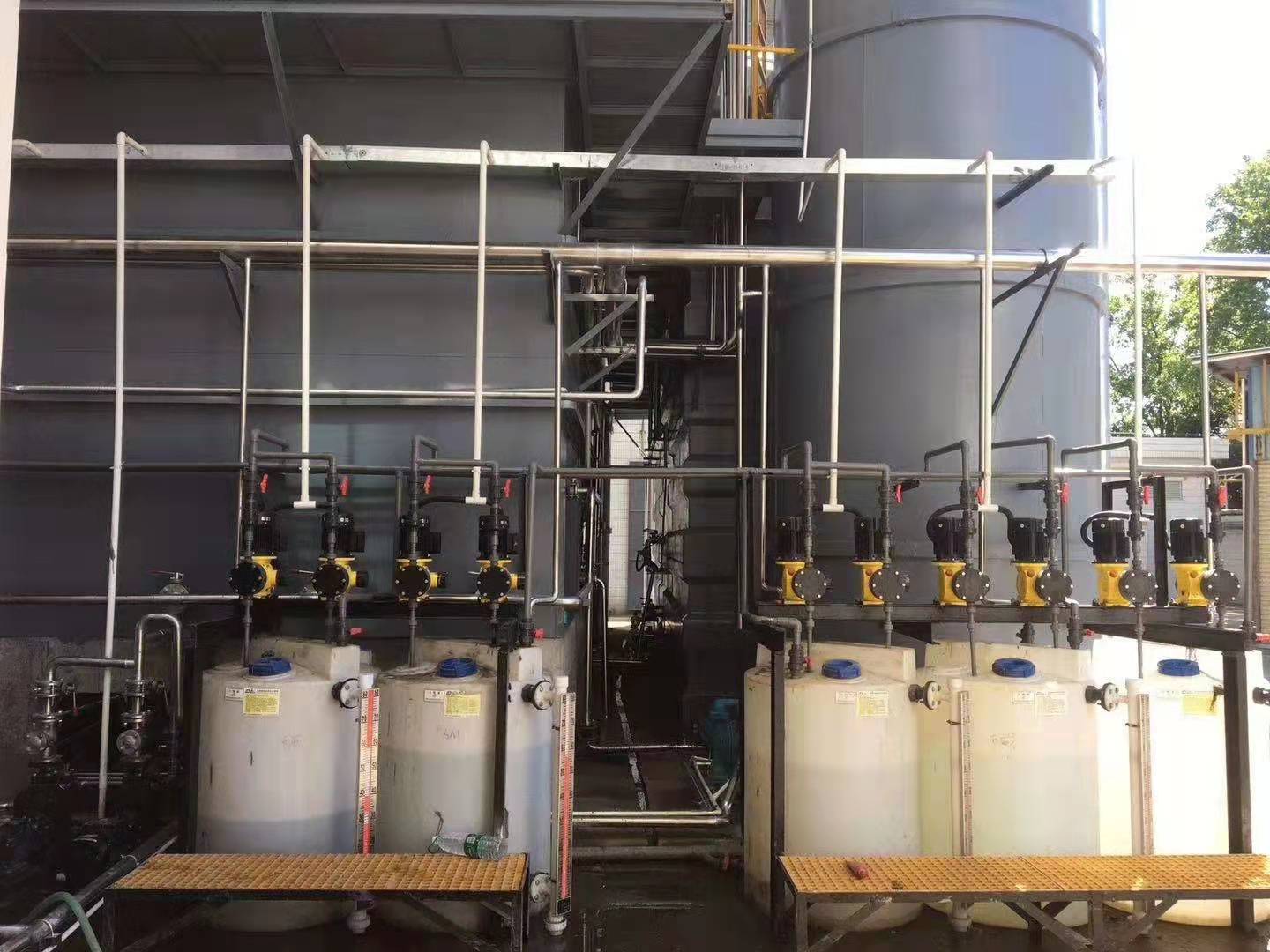 Outdoor chemical dosing station — solenoid pumps with chemical storage tanks